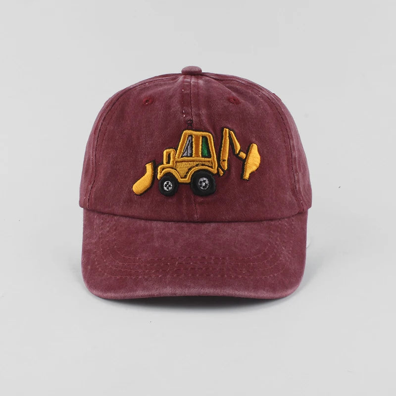 Maroon cap with a yellow bulldozer emblem on a light gray background