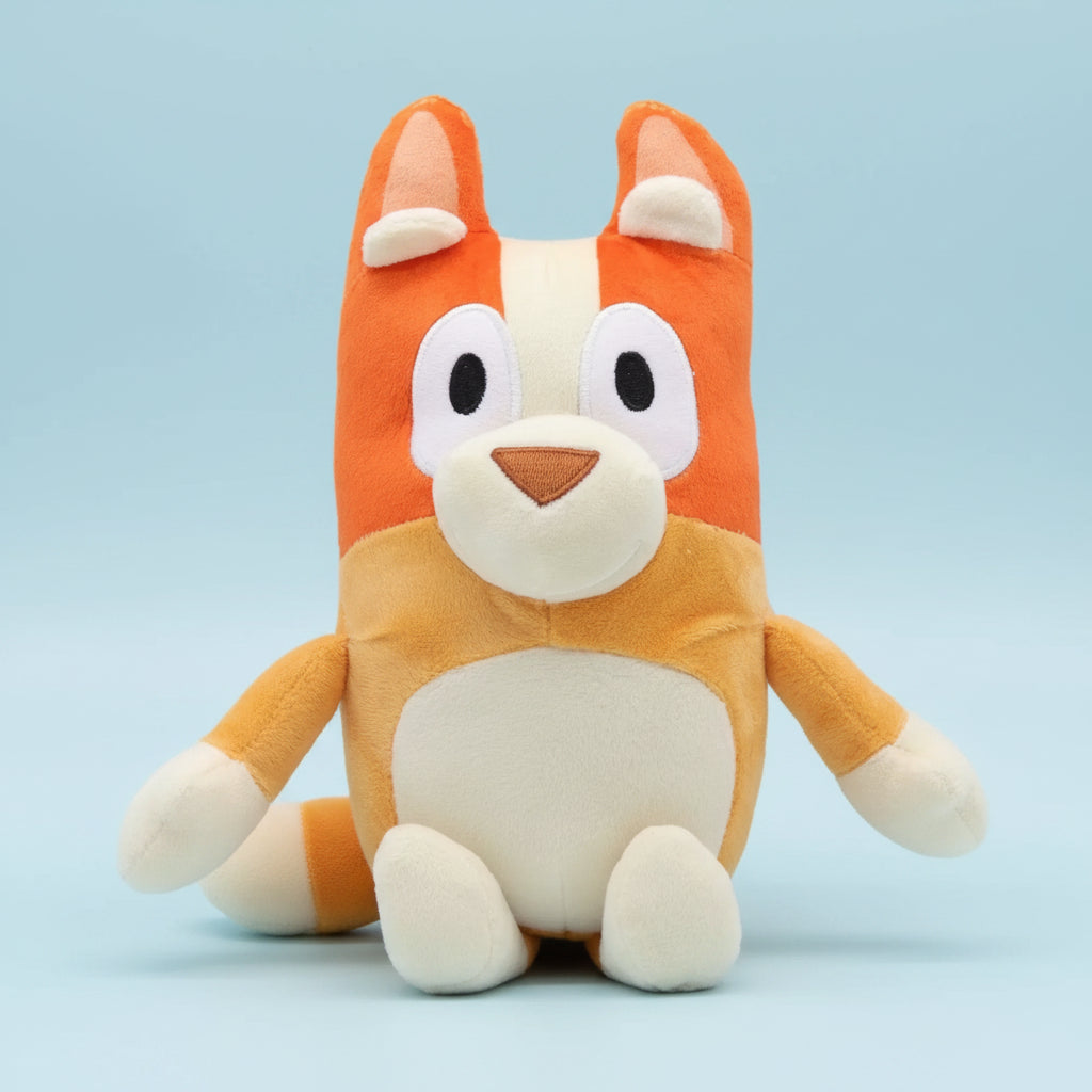 Plush toy resembling a fox with orange and white colors on a white background