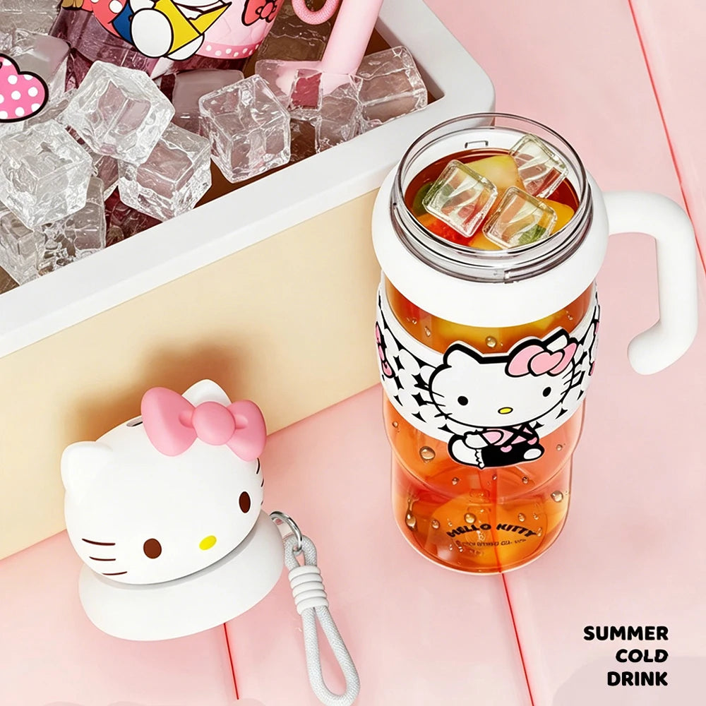 Hello Kitty-themed tumbler with ice cubes on a pink background