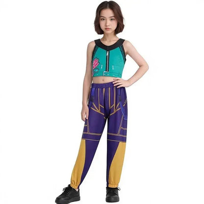 A young woman modeling a matching athletic outfit consisting of a sleeveless crop top and jogger pants with a purple, teal, and gold geometric pattern, set against a plain white background.