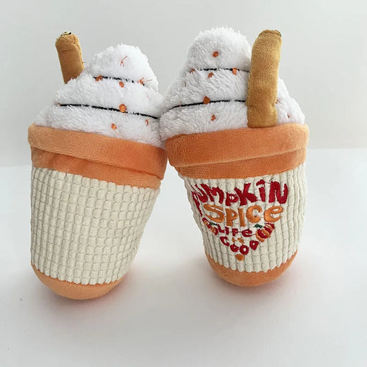 Pair of dog toys with pumpkin spice text on a white background