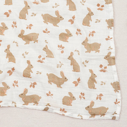 Fabric with brown bunny pattern on a white background