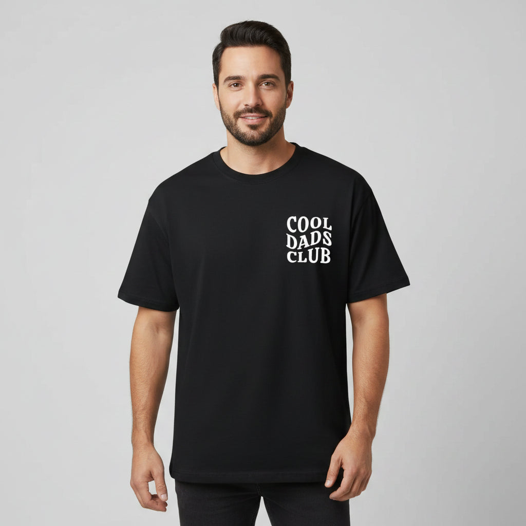 Man wearing black cool dads club tshirt