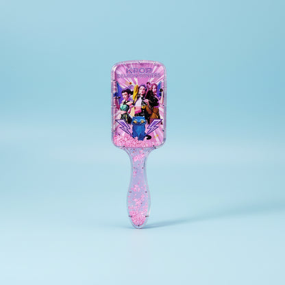 Pink hairbrush with KPOP design on a white background
