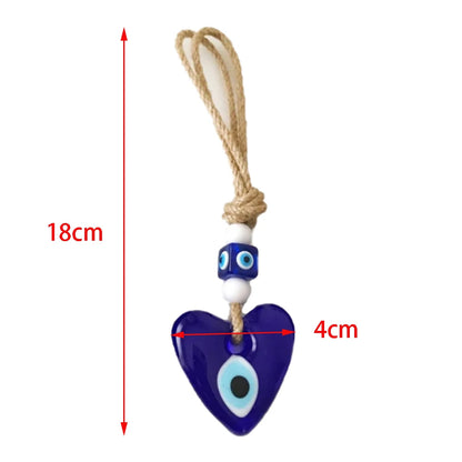 Blue heart-shaped evil eye pendant with measurement details on a white background