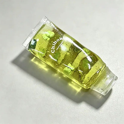 Green skincare product with 'Chiboki' branding on a light gray background