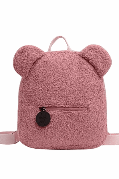 Pink backpack with bear ears on a white background