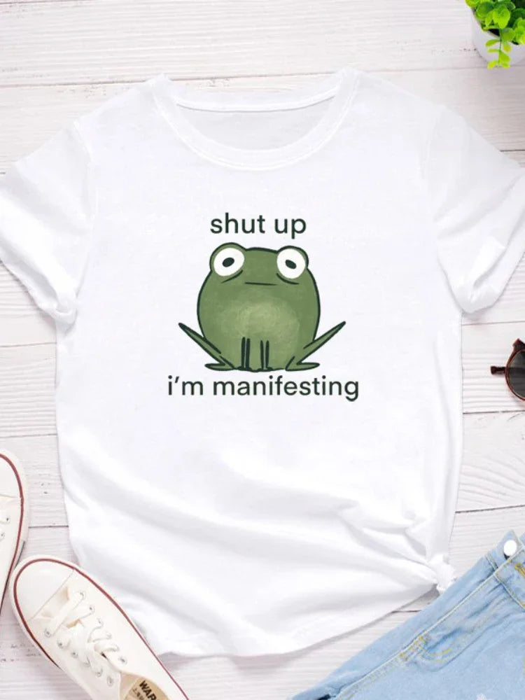 I'm Manifesting Frog Print Graphic T Shirt - T Shirts from Dear Cece - Just £14.99! Shop now at Dear Cece