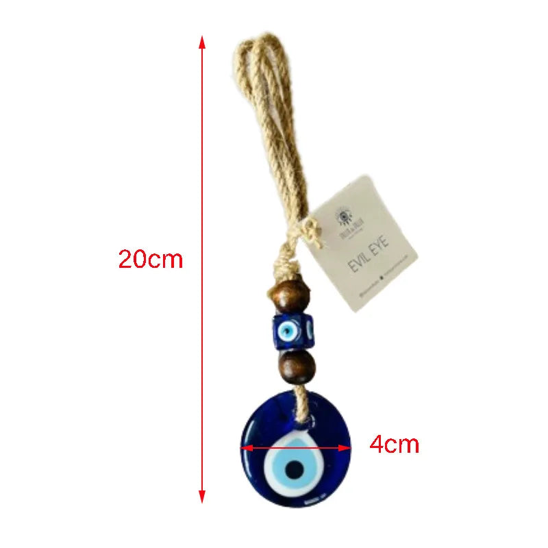 Evil eye pendant with measurement details on a white background