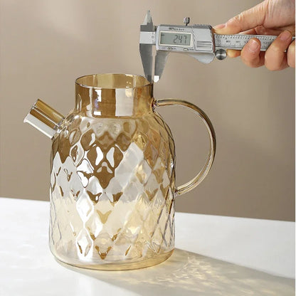 Glass pitcher with textured surface being measured with digital caliper against a neutral background