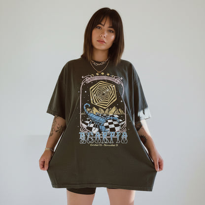 woman wearing scorpio graphic tshirt
