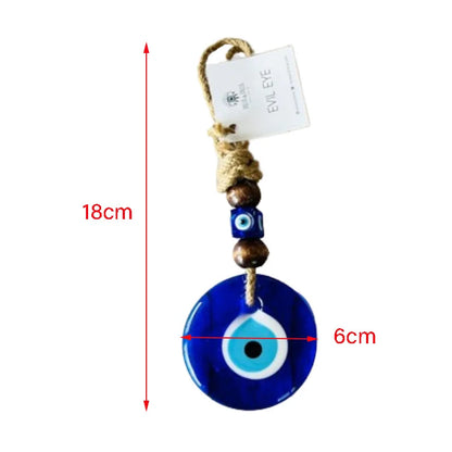Blue evil eye pendant with measurements and a tag on a white background