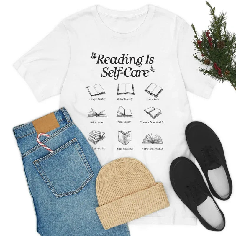 Reading Is Self-Care Bookworm Graphic T-Shirt - T Shirts from Dear Cece - Just £15.99! Shop now at Dear Cece