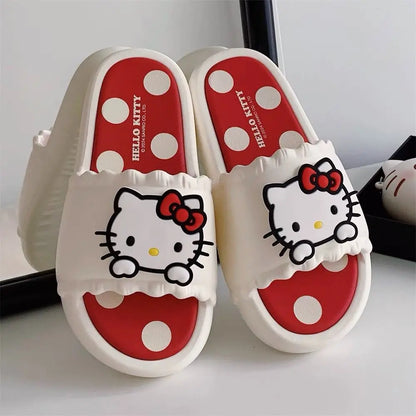 Hello Kitty slippers with red and white polka dots on a light background