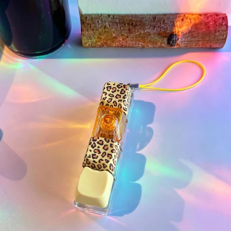 Handheld device with leopard print design on a colorful background
