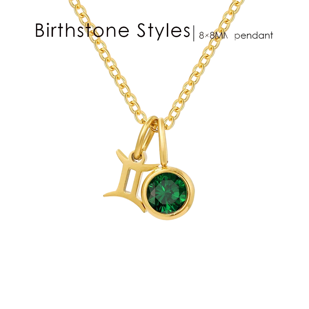 Gold pendant with green gemstone and 'Birthstone Styles' text on a white background