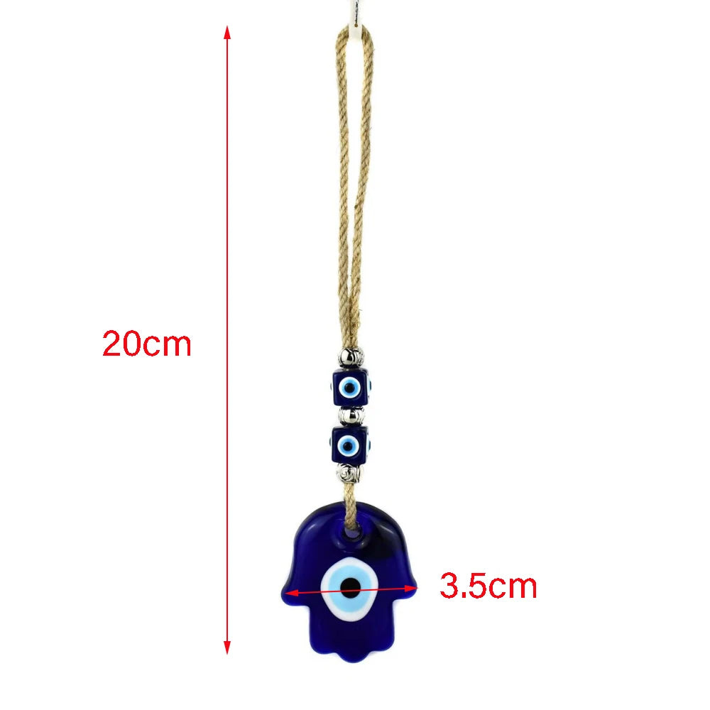 Blue evil eye pendant with measurement details on a white background