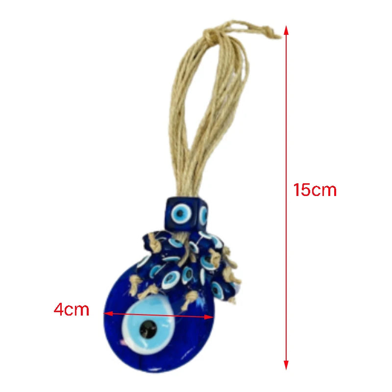Blue evil eye pendant with measurements on a white background