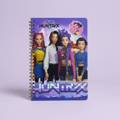 Notebook with Huntrax characters on a purple background