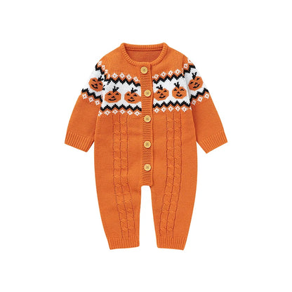 Orange knitted baby romper with pumpkin pattern on a white background