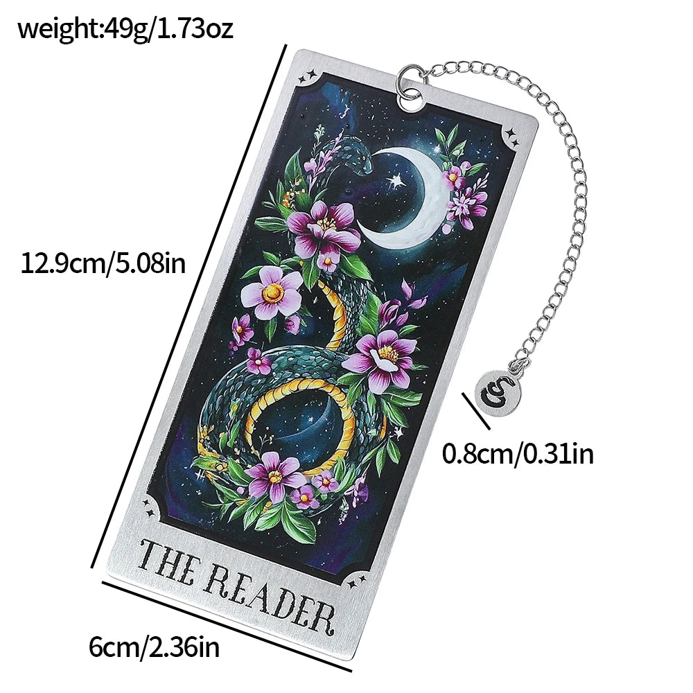 Decorative keychain with snake, flowers, and moon design, showing measurements and weight.