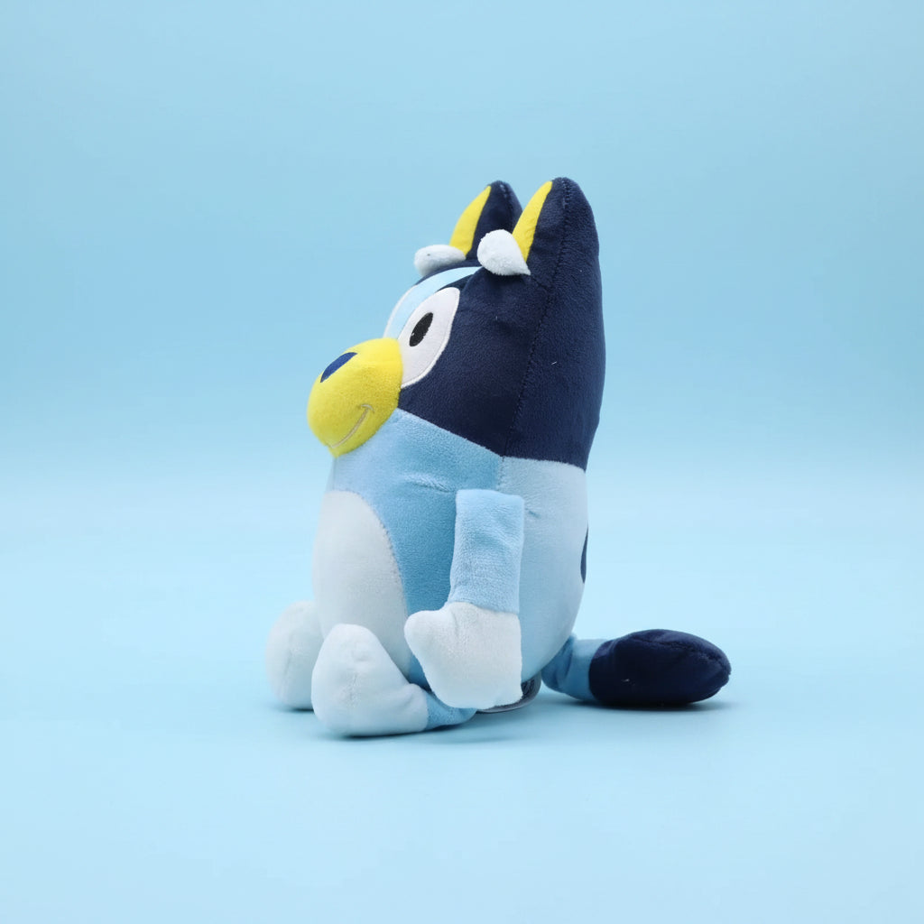 Plush toy with blue, yellow, and white colors on a white background