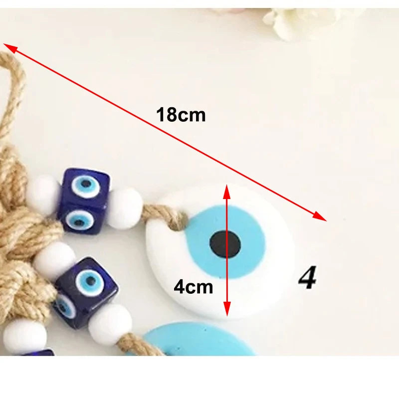 Evil eye beads with measurements on a white background