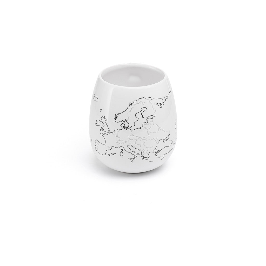 White ceramic cup with a map design on a white background