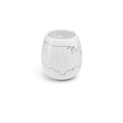 White ceramic cup with a map design on a white background