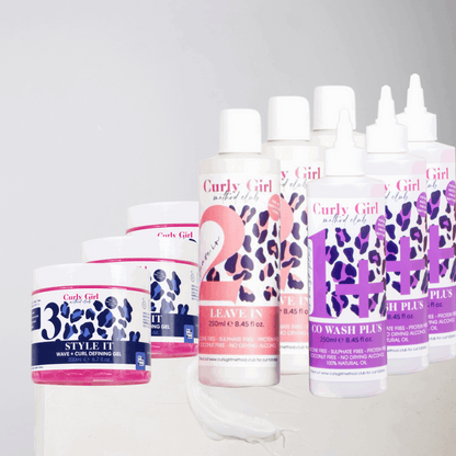 Collection of Curly Girl hair care products on a white background