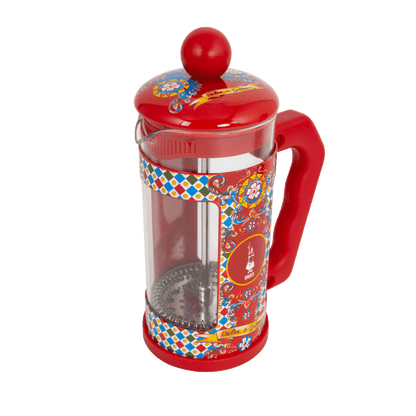 Red French press coffee maker with colorful pattern on a transparent background