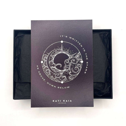 Purple packaging box with star and moon design and text, featuring the brand 'Kati Kaia'.