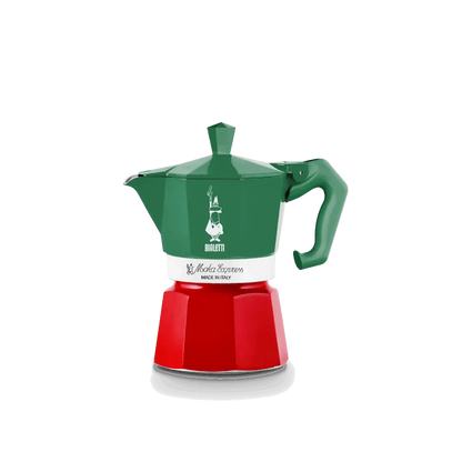 Green and red coffee maker with a white base on a white background