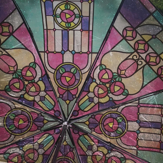 product video of stained glass umbrella in action on a rainy day