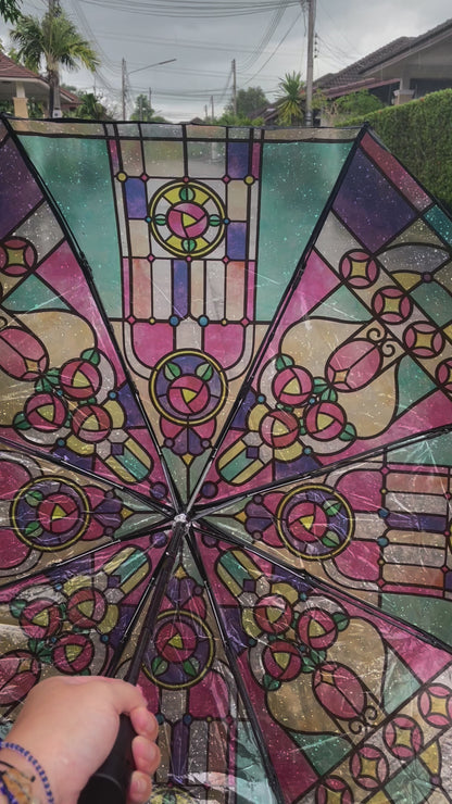 product video of stained glass umbrella in action on a rainy day