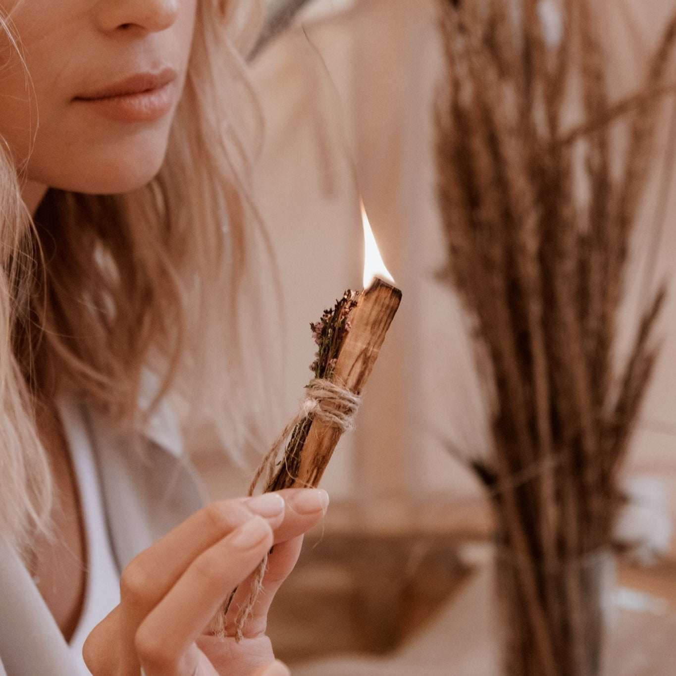 woman burning sage
