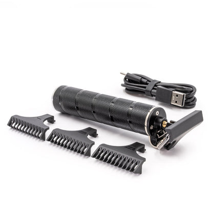 Black grooming tool set with attachments and USB cable on a white background