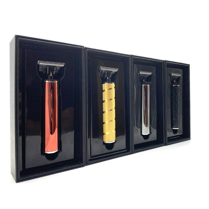Four different razors in black display cases on a white background