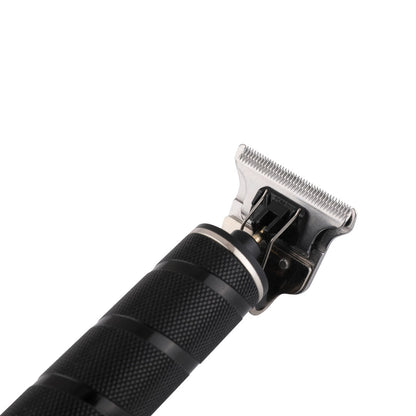 Black grooming clipper on a white background